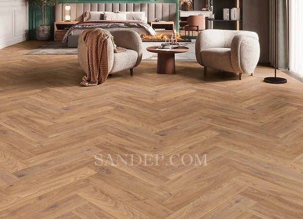 Lấy cảm hứng từ nghệ thuật lát sàn châu Âu cổ điển, sàn gỗ xương cá Jawa Cốt xanh là sự kết hợp hoàn hảo giữa kỹ thuật chế tác hiện đại và thẩm mỹ hiện đại tinh tế. Sản phẩm không chỉ là vật liệu lát sàn, mà còn là yếu tố tạo nên linh hồn cho không gian sống – khác biệt, nhưng sang trọng, hài hòa. Ván sàn gỗ xương cá Jawa sử dụng cốt gỗ HDF xanh nhập khẩu Indonesia có tỉ trọng cao giúp sàn bền vững với thời gian, chịu ẩm tốt, thi công linh hoạt, dễ dàng kết hợp với nhiều phong cách nội thất. Nếu bạn đang tìm kiếm một giải pháp sàn gỗ xương cá giá rẻ vừa đẳng cấp, vừa thực tế cho điều kiện khí hậu Việt Nam – Jawa Cốt xanh chính là sự lựa chọn vượt trội.  Thông tin kỹ thuật Sàn gỗ xương cá Jawa - Mã màu: 151, 152, 153, 162, 163, 164, 166, 168 - Kích thước tấm: 604 x 94 x 12mm - Quy cách đóng hộp: 36 tấm/hộp, tương đương 2,0439 m² - Bề mặt: Sần vân gỗ tự nhiên, tạo cảm giác chân thực và sang trọng - Cốt gỗ: HDF lõi xanh cao cấp, nhập khẩu từ Indonesia - Xuất xứ: Sản xuất tại Việt  Ưu điểm Sàn gỗ xương cá cốt xanh Jawa Thi công kiểu xương cá sang trọng  Sàn gỗ công nghiệp Jawa cao cấp được thiết kế để lắp đặt theo kiểu xương cá cổ điển – một xu hướng đang được ưa chuộng tại các công trình cao cấp, từ căn hộ hiện đại đến biệt thự sang trọng. Cách lát này tạo nên hiệu ứng thị giác mạnh mẽ, giúp không gian rộng hơn, có chiều sâu và mang đậm dấu ấn cá nhân. Cốt gỗ HDF xanh nhập khẩu Indonesia Jawa sử dụng lõi HDF xanh được nhập khẩu từ Indonesia, có tỉ trọng cao tới 850 kg/m³ – giúp sàn gỗ Jawa có độ cứng chắc, bền bỉ, hạn chế cong vênh, co ngót trong quá trình sử dụng. Khi ngâm trong nước ở điều kiện tiêu chuẩn 24h, độ trương nở chỉ khoảng 8%, cho thấy khả năng kháng ẩm vượt trội so với các loại cốt thông thường. Đây là lựa chọn lý tưởng cho khí hậu nóng ẩm tại Việt Nam, đặc biệt phù hợp với sàn tầng trệt hoặc khu vực gần bếp, ban công. Bề mặt sần vân gỗ Bề mặt được dập sần với lớp phủ chống trầy đạt tiêu chuẩn AC4, vừa tạo cảm giác chân thật như gỗ tự nhiên, vừa tăng độ bám, hạn chế trơn trượt – đặc biệt an toàn cho trẻ nhỏ và người cao tuổi. Màu sắc phong phú, dễ phối hợp nội thất Với 8 mã màu (151, 152, 153, 162, 163, 164, 166, 168), sàn gỗ Jawa xương cá mang đến nhiều sự lựa chọn phù hợp với nhiều phong cách thiết kế – từ hiện đại tối giản đến cổ điển sang trọng. Độ an toàn cao, thân thiện môi trường Jawa cao cấp đạt tiêu chuẩn khí thải E1 – đảm bảo nồng độ Formaldehyde cực thấp, an toàn với sức khỏe người dùng. Lớp cốt không chứa chất độc hại, không mùi khó chịu, phù hợp cho mọi không gian sinh hoạt, kể cả phòng trẻ em. Báo giá sàn gỗ xương cá Jawa cốt xanh Tên sản phẩm	Mã màu	Kích thước (mm)	Đóng gói	Đơn giá (VNĐ/m²) Sàn gỗ xương cá Jawa Cốt xanh	151, 152, 153, 162, 163, 164, 166, 168	604 x 94 x 12	36 tấm/hộp = 2,0439 m²	450.000 VNĐ Lưu ý: - Giá đã bao gồm thuế VAT 10%, chưa bao gồm chi phí vận chuyển và thi công. - Vui lòng liên hệ trực tiếp để nhận báo giá chiết khấu cho đơn hàng số lượng lớn hoặc công trình. - Có sẵn mẫu thực tế và tư vấn chọn màu theo phong cách nội thất. Ứng dụng  Sàn gỗ Jawa xương cá cốt xanh thích hợp sử dụng trong: - Căn hộ cao cấp, biệt thự, nhà phố - Văn phòng làm việc theo phong cách hiện đại - Showroom trưng bày sản phẩm, phòng trưng bày nghệ thuật - Khách sạn, nhà hàng, resort cao cấp Lý tưởng để lát nền phòng khách, phòng ngủ, hành lang, phòng làm việc hoặc không gian sinh hoạt chung có yêu cầu cao về tính thẩm mỹ và độ bền. Mua sàn gỗ Jawa xương cá cốt xanh ở đâu? Công ty CP Sàn Đẹp là một trong những đơn vị hàng đầu tại Việt Nam chuyên cung cấp và thi công các loại sàn gỗ công nghiệp cao cấp, đặc biệt là dòng sàn gỗ xương cá Jawa Cốt xanh chính hãng. Với hơn 10 năm kinh nghiệm trong lĩnh vực sàn gỗ, Sàn Đẹp luôn cam kết mang đến: - Sản phẩm chính hãng, đầy đủ chứng nhận nguồn gốc và tiêu chuẩn chất lượng. - Đội ngũ tư vấn và kỹ thuật chuyên nghiệp, khảo sát tận nơi, thi công chuẩn kỹ thuật xương cá. - Giá cả cạnh tranh, chiết khấu tốt cho đại lý, công trình và khách hàng số lượng lớn. - Bảo hành chính hãng 15 năm, hỗ trợ kỹ thuật nhanh chóng trong suốt quá trình sử dụng. Thông tin liên hệ Sàn Đẹp - Showroom chính: 339 Hoàng Quốc Việt, Cầu Giấy, Hà Nội - Kho hàng: 38 Đại Từ, Hoàng Mai, Hà Nội - Hotline/Zalo: 0916 422 522 - Website: www.sandep.com.vn - Email: sandep.jsc@gmail.com